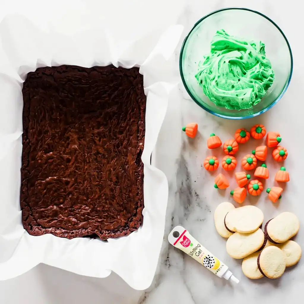 Brownie, green frosting, candy pumpkins